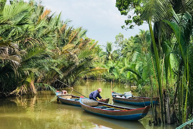 Ben Tre Mekong Zig Zag: Scooter, Sailboat, and Food (Full day) - Ben Tre city streets and the market: food and local rhythm