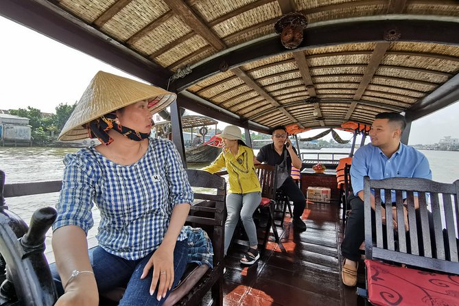 Cai Be Village - One-Day Mekong Delta Adventure - The floating market on the Tien River: wooden boats and real daily rhythm