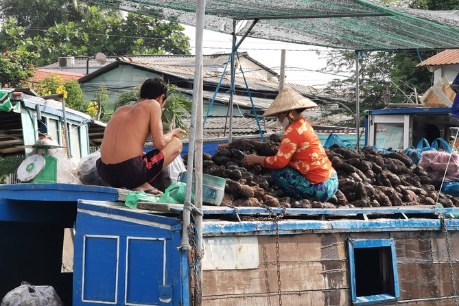 Cai Be Village - One-Day Mekong Delta Adventure - Bicycle along the paddy village road: a calmer rhythm after the river