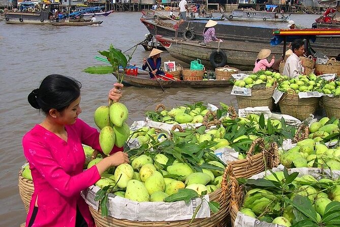 Cai Rang Floating Market & Mekong Delta 2-Day Tour from HCM City - Day 1: Vinh Trang Pagoda and Ben Tre coconut craft country