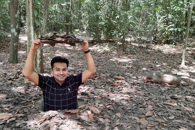 Crawl and Paddle Full day Cu Chi Tunnels and MeKong Delta - Coconut candy families, handicrafts, and tropical gardens