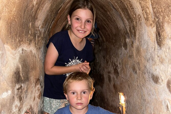 Cu Chi Tunnels & Mekong Delta Small-Group Tour from Ho Chi Minh - Coconut Candy Mill, Honey Tea, and Folk Music