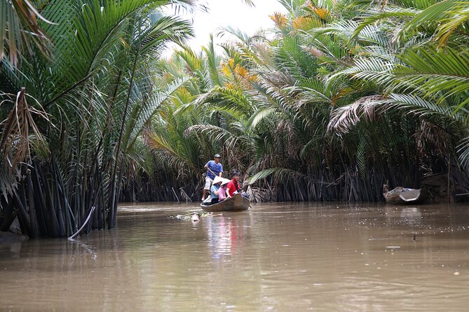 Essential Mekong Delta: Highlights Tour from Ho Chi Minh City - My Tho River Cruise: islands, fish farms, and daily life