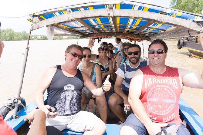 Essential Mekong Delta: Highlights Tour from Ho Chi Minh City - Bến Tre lunch and orchard time before heading back