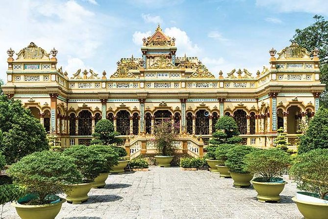 From HCM City: Mekong Delta Tour with Sampan Journey - Ben Tre: Coconut Country, Orchard Lunch, and Folk Music Moments
