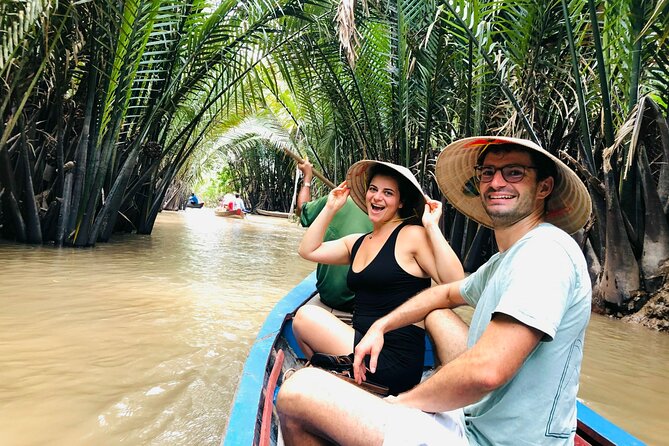 From Ho Chi Minh City: Discover Mekong Delta & Coconut Village - My Tho boat rides: fish cages, floating homes, and a calmer canal