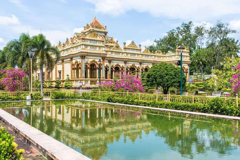 From Ho Chi Minh: Mekong Delta Small Group Day Trip - Vinh Trang Pagoda: Go Early, Dress Right, and Look Up