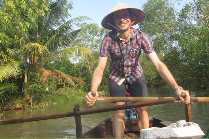 Full-day Cai Rang floating market - explore countryside, make bakery - from HCM - Cồn Sơn island time: villages, ferry rides, and fish encounters