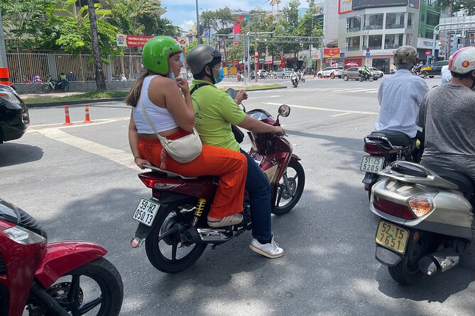 Good Morning Saigon Tour by Motorbike and Scooter - District 4 street stop: where morning vendors start work