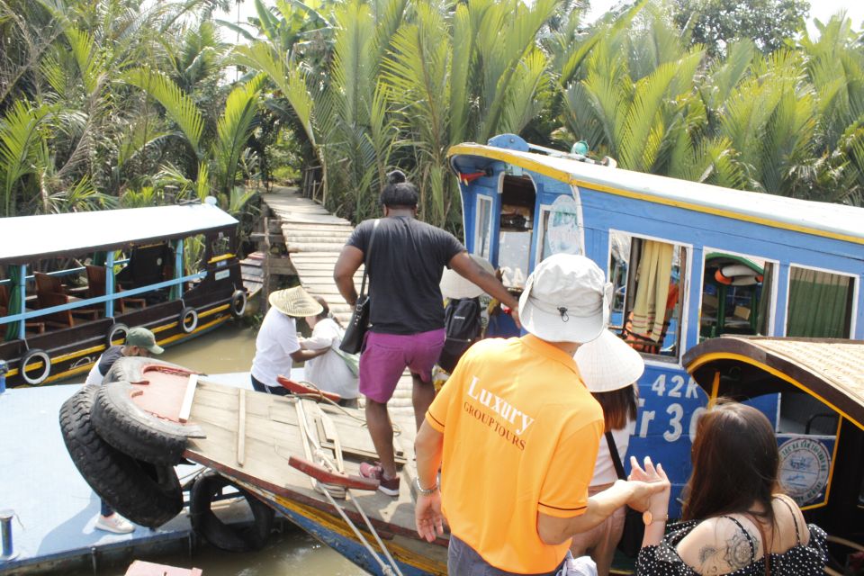 HCM: Mekong Delta, My Tho & Ben Tre Coconut Village - Lunch by the Water, Tropical Fruit, and Folk Music in an Orchard