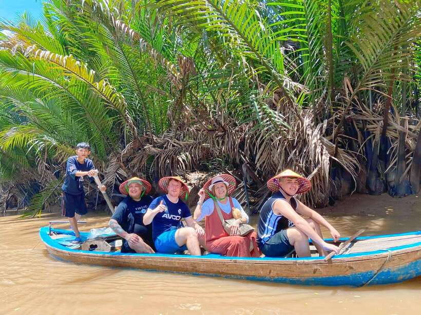 HCMC: Cu Chi Tunnels & Mekong Delta VIP Tour by Limousine - Entering the Cu Chi Tunnels: survival design, trap talk, and the weapons room