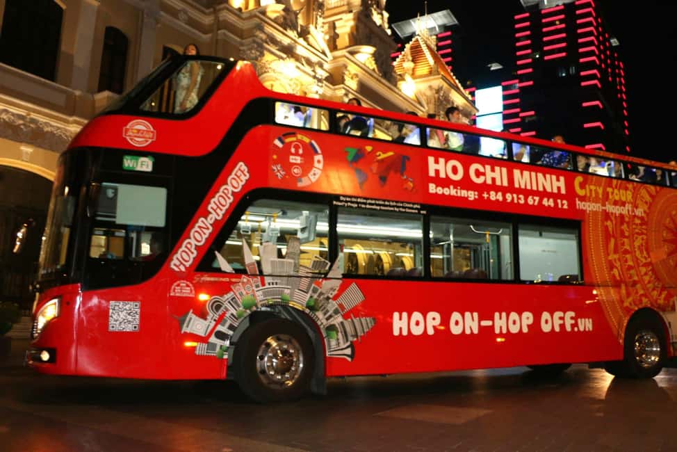 Ho Chi Minh City: Late-Night Open-Top Bus Tour - The Route in Plain Sight: District 1 to Ba Son Bridge and Back