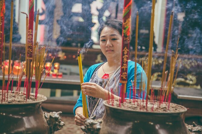 Ho Chi Minh City Motorbike Tour with Student | Saigon Adventure - The unseen Saigon stops: Thich Quang Duc, local markets, apartments, Chinatown, and a pagoda