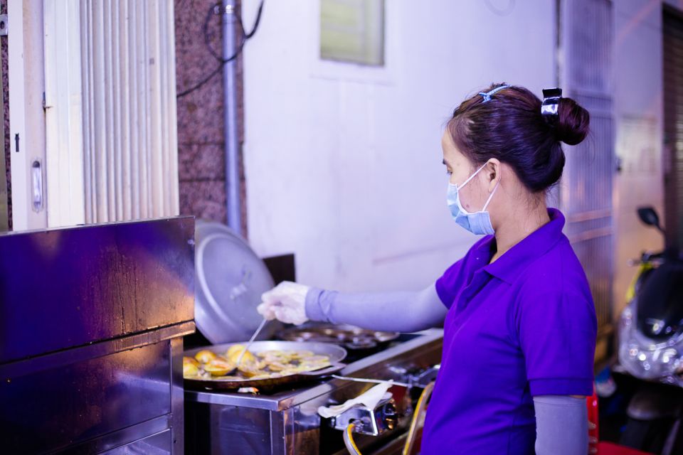 Ho Chi Minh City: Private Street Food Motorbike Tour - District 4 seafood (or BBQ swap) plus flan, coffee, and banana sticky rice wine