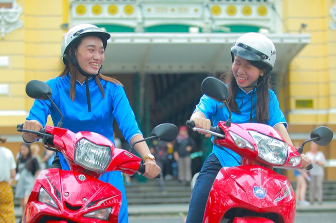 Ho Chi Minh City Tour by Motorbike with Female Riders | KissTour - Independence Palace, from the road: quick context for a big symbol