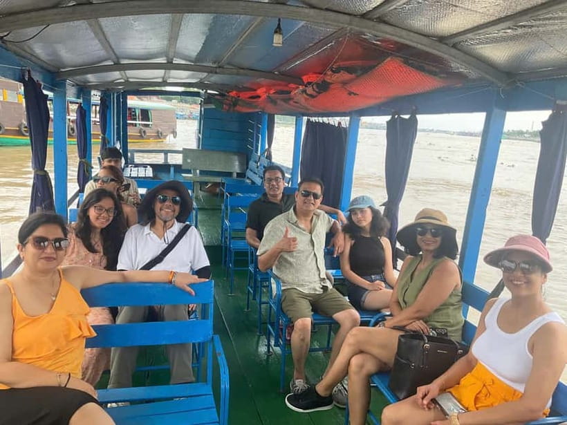 Mekong Delta 2 Days: Floating Markets & Cultural Exploration - Boats, bikes, sun, and temple rules: the practical side