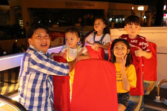 Night Bus Tour in Ho Chi Minh City - The illuminated landmark pass: what you see, and what you don’t stop for