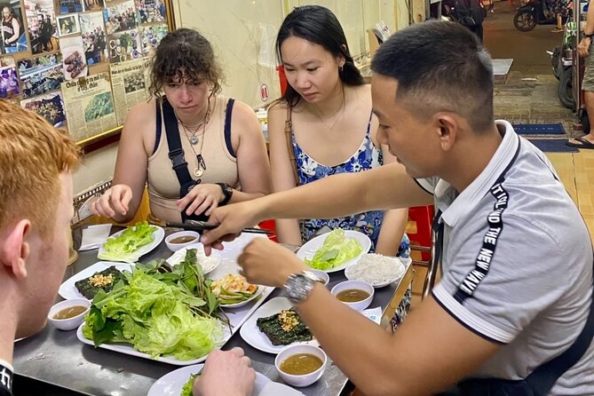 Private Saigon Ultimate Street Food & Motorbike Experience - Markets and neighborhoods: flower stalls, Chinatown, and real routing