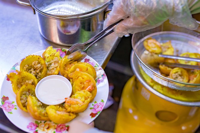 Private Street Food Evening Walking Tour in Ho Chi Minh City - Taxi pickup, private group, and getting off the tourist routes