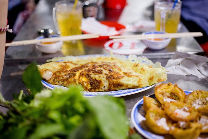 Private Street Food Motorbike Tour in Ho Chi Minh City - District 5: where coconut desserts turn into a full treat