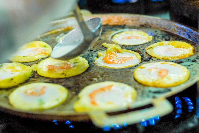 Private Street Food Motorbike Tour in Ho Chi Minh City - District 4: seafood meal, flan dessert, and a satisfying finish