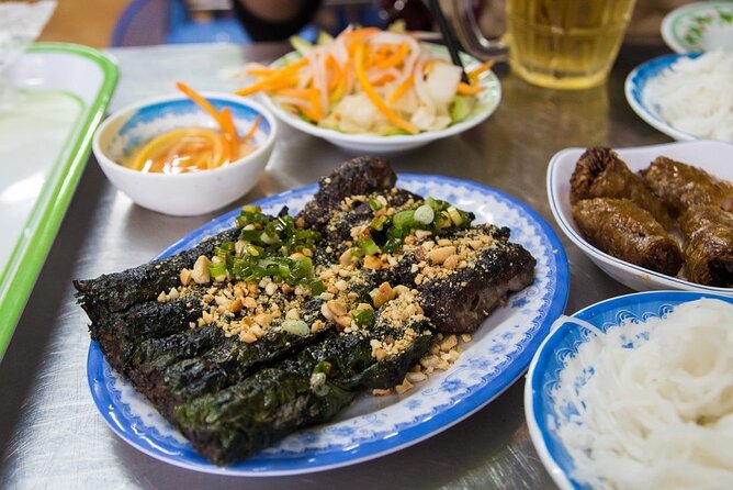 Private Street Food Tour by Motorbike in Ho Chi Minh City - District 1 flavor opening: Gỏi Đu Đủ and Dừa Tắc