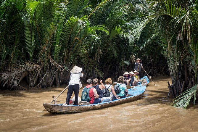 Private Tour to Explore Cu Chi Tunnels and Mekong Delta - Tien River cruise: islands, stilt houses, and slow river life