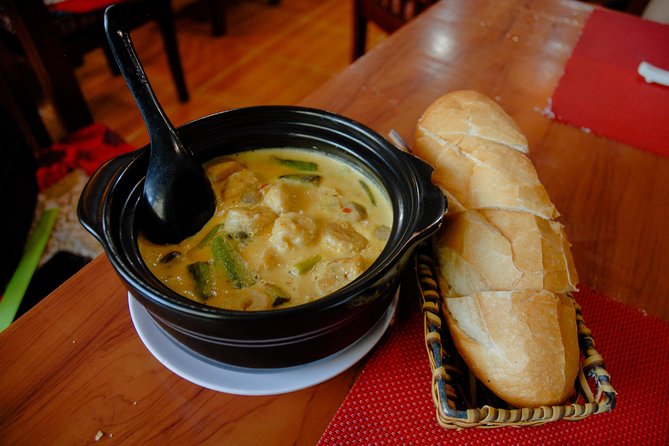 Private Vegan Food Tour By Scooter in Ho Chi Minh City - District 10’s market maze: flowers, alleys, and crispy banana snacks