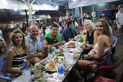 Saigon After Dark Vespa Street Food Tour + Live Music 4 hours - Stop 1: The coffee shop meeting point and the first back-alley ride