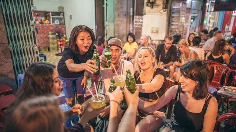 Saigon at Sunset: Ultimate Street Food Experience - Street beer pairing: peanuts and rice crackers, the simple way locals drink