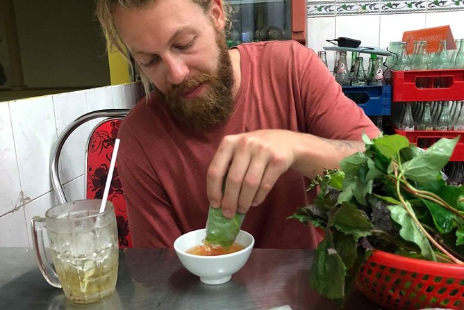 Saigon By Night and Street Food By Motorbike | Opt: Ao Dai Riders - Stop 3: Nguyễn Trãi Street for shopping energy between bites