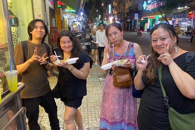 Saigon by Night: Private Street Food Walk You Can’t Miss - District 3 at night: a look at routines, not a staged show