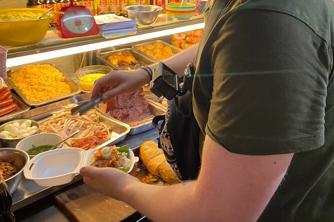Saigon by Night: Private Street Food Walk You Can’t Miss - Vietnamese Pizza, a seafood challenge, then dessert-ready energy