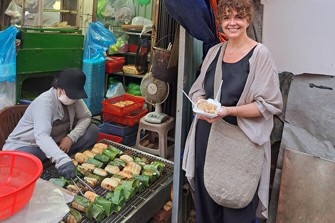 Saigon Food Tour by Scooter with Eleven Tastings - District 3 cooking moment: grilled banana sticky rice and your bánh xèo class