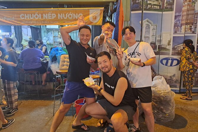 Saigon Food Tour by Scooter with Eleven Tastings - Ho Thi Ky Flower Market: pizza-style grilled rice paper and stuffed snails