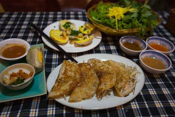 Saigon Night Street Food and City Tour on Scooter - Scooter riding in Ho Chi Minh City: what safety feels like
