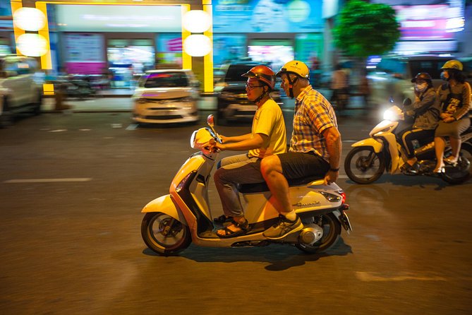 Saigon Night Street Food and City Tour on Scooter - BBQ time: the street grill experience you can smell