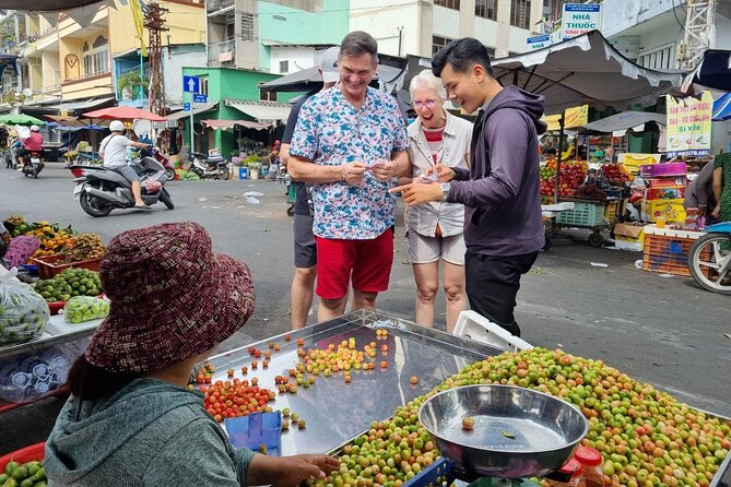 Saigon Private/Small Group Walking Food Tour with 13 Tastings - Ho Thi Ky Flower Market: grilled rice paper, snails, sweet potatoes, and skewers
