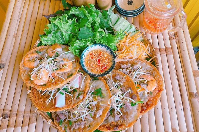 Saigon Scooter Adventure - City Sights & Street Food Tour - Ban Co Market rides: narrow lanes and market-eye focus