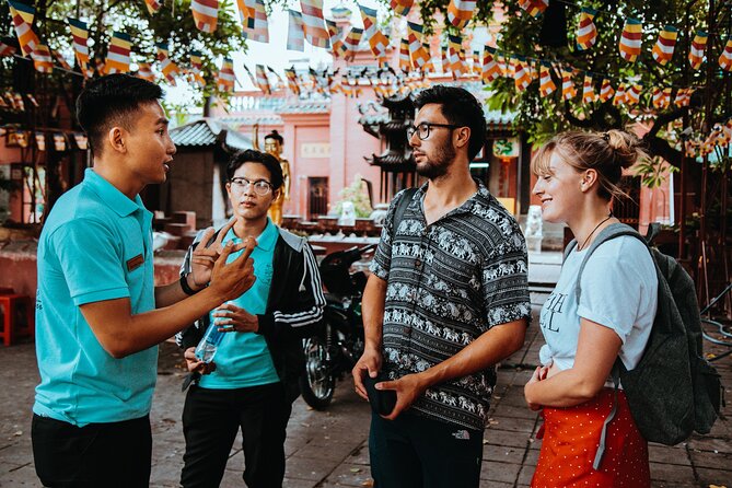 Saigon Sightseeing & Street Food Tour By scooter with Student - Landmark time: icons mixed with everyday Saigon