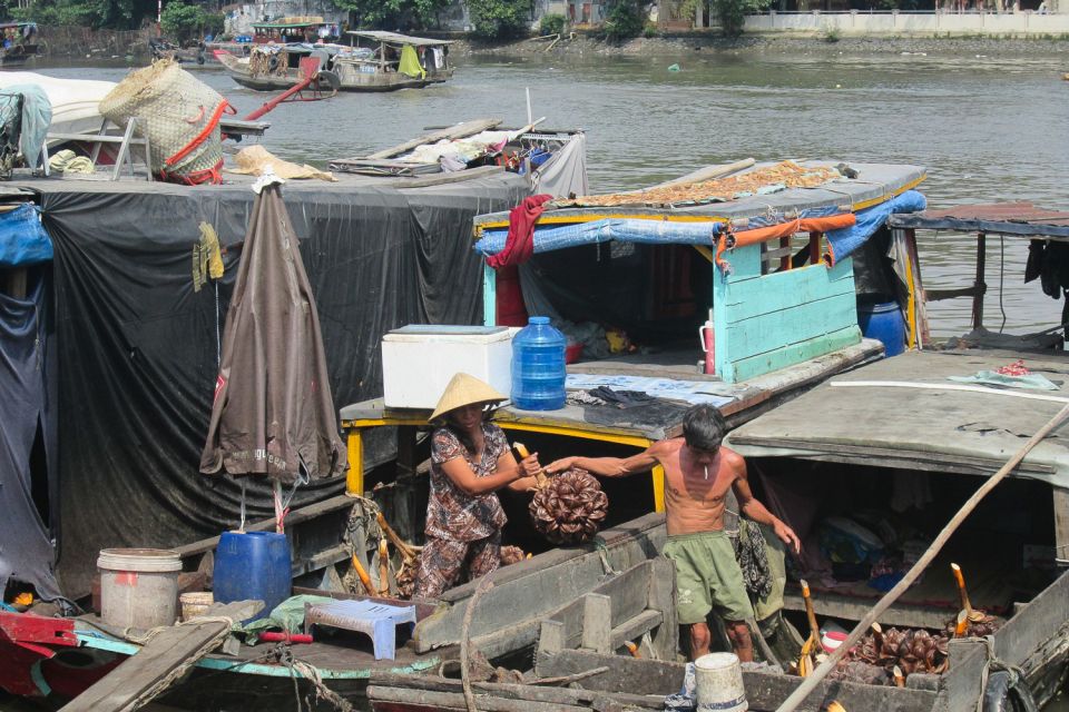 Saigon Slum Tour with Motorbike - The floating market stop: a different kind of economy