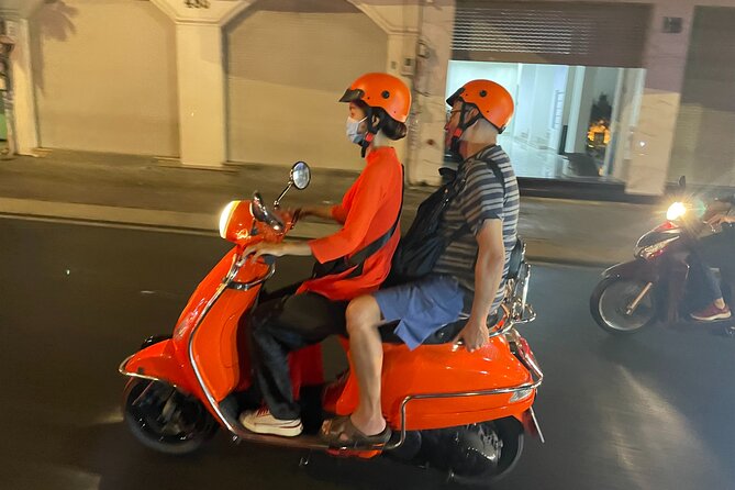 Saigon Vespa By Night Street Food With Female Riders Ao Dai - Saigon after dark at 6:00 pm: why timing matters