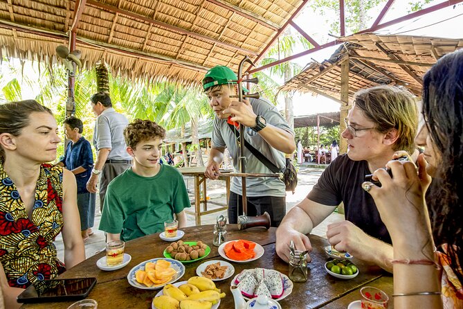 Small-Group Mekong Delta Day Trip: Boat Ride, Cottages & Pagoda - Bike option vs. relaxed garden time: choose your energy