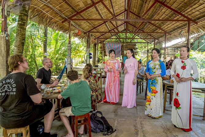 Small-Group Mekong Delta Day Trip: Boat Ride, Cottages & Pagoda - Traditional songs and dance, plus the Unicorn Island singing moment