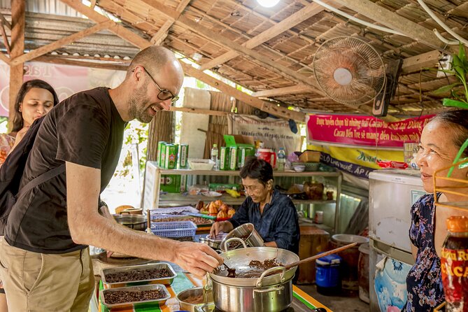 Small-Group Mekong Delta Day Trip: Boat Ride, Cottages & Pagoda - Vĩnh Tràng Pagoda: faith stop, big statues, photo time