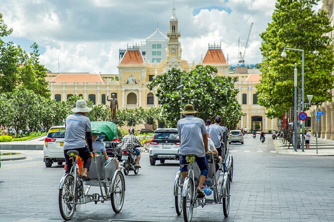 Small-group Saigon City Tour: 1-day Must-See Icons & Cyclo Ride - Ben Thanh Market: souvenirs, snacks, and the clock