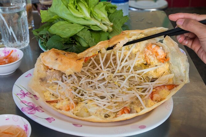Super Niche Walking Street Food Tour in Ho Chi Minh City - Ho Thi Ky Flower Market: the wholesale engine behind everyday life