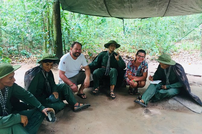 VIP Tour Cuchi Tunnels & Mekong Delta Cruise Full Day Group 12pax - Cu Chi Tunnels: Morning Pickup and the Drive Out of Ho Chi Minh City